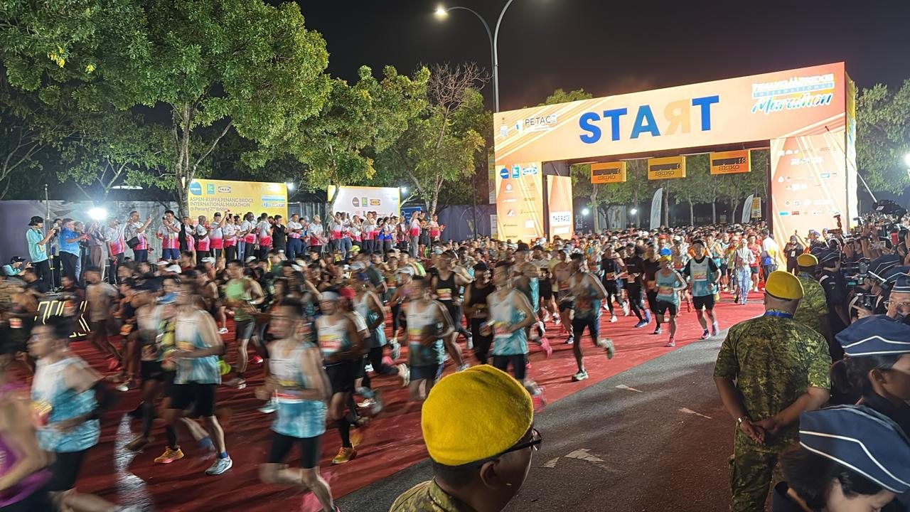 Runners gathered at the Penang Bridge International Marathon start line